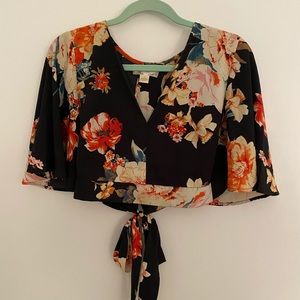 Black floral tie shirt.